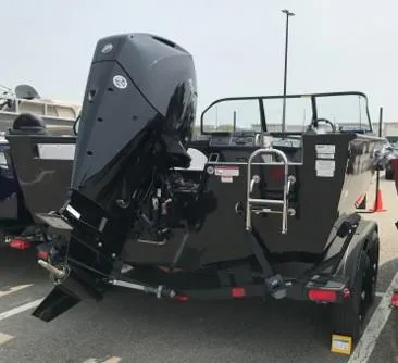Slide: The Image of 2023 Ranger VX1888 WT boat with outboard motor in parking lot. - 4