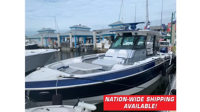 The Image of 2023 Formula 387 Center Console Sport boat docked, nationwide shipping available. - 0
