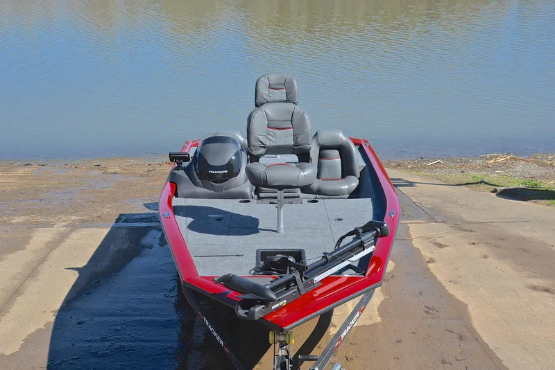 Slide: The Image of 2021 Tracker 175 TXW boat on a ramp by the water. - 17