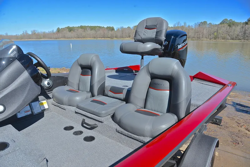 Slide: The Image of 2021 Tracker 175 TXW boat with gray seats on a lake. - 18