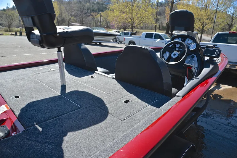 Slide: The Image of 2021 Tracker 175 TXW boat interior with steering console and seating. - 19