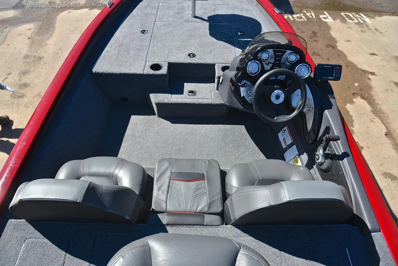 Slide: The Image of 2021 Tracker 175 TXW boat interior with steering console and seating. - 20