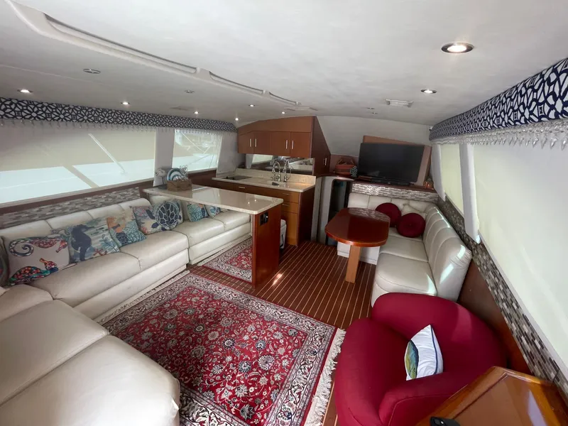 Slide: The Image of Luxurious interior of a 2000 Ocean Yachts Convertible with elegant seating and decor. - 3
