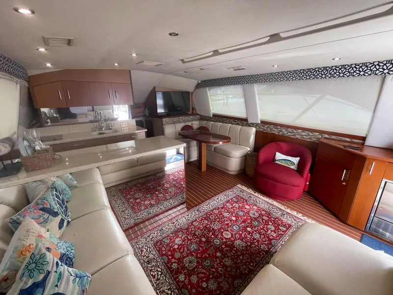 Slide: The Image of Luxurious interior of a 2000 Ocean Yachts Convertible with elegant seating and decor. - 4