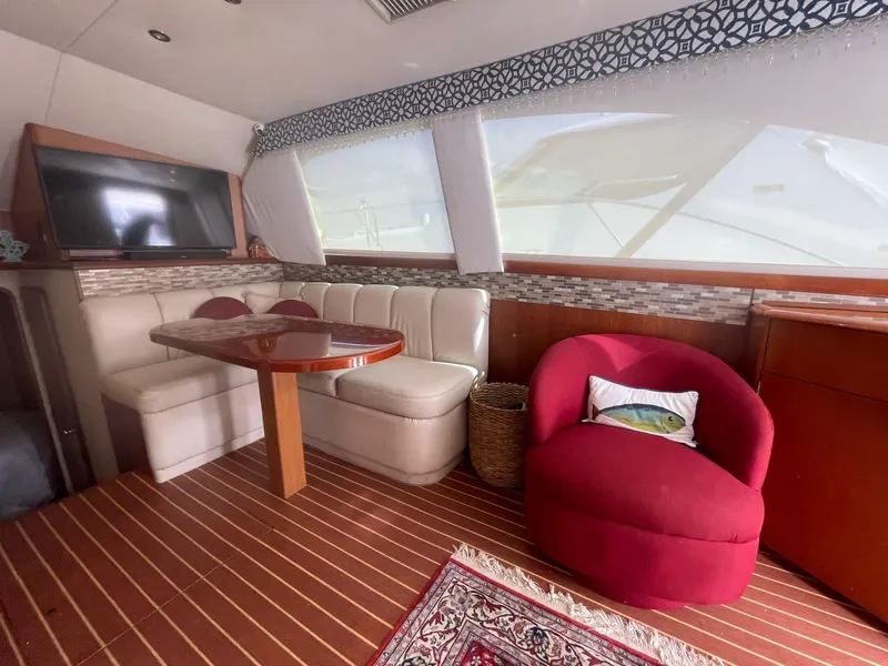 Slide: The Image of Interior of 2000 Ocean Yachts Convertible with plush seating and elegant decor. - 6
