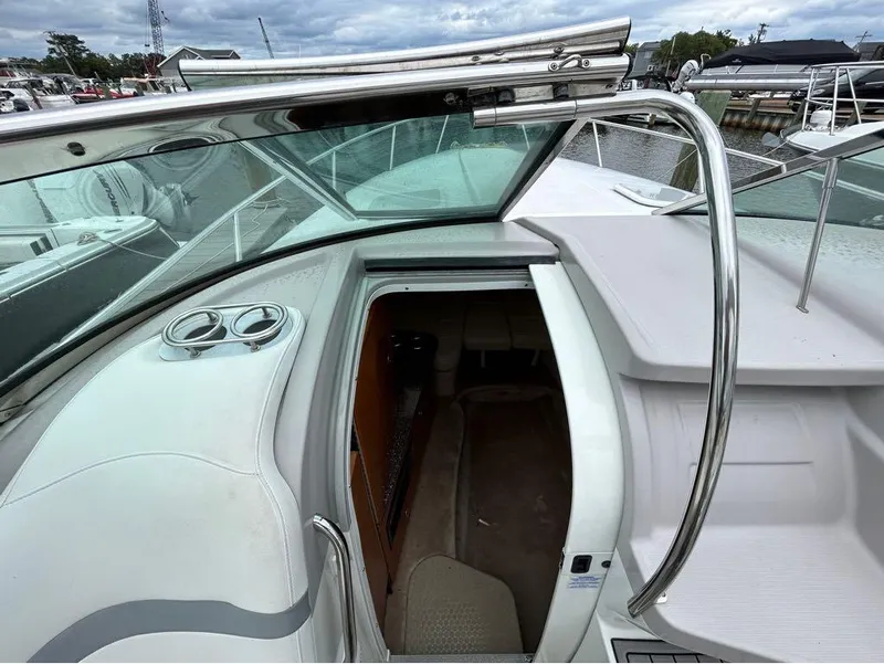 Slide: The Image of 2004 Formula 330 SS boat interior view with open cabin door. - 5