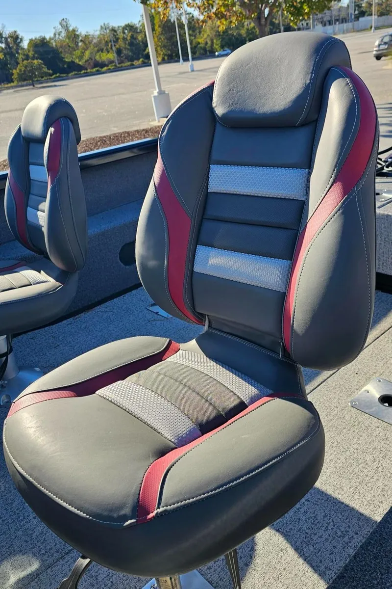 Slide: The Image of 2023 Ranger VS1882SC Angler boat seats with red and gray accents. - 6