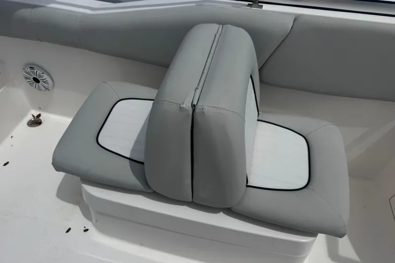 Slide: The Image of 2020 Sea Fox 226 Traveler boat seat with gray upholstery and speaker detail. - 16
