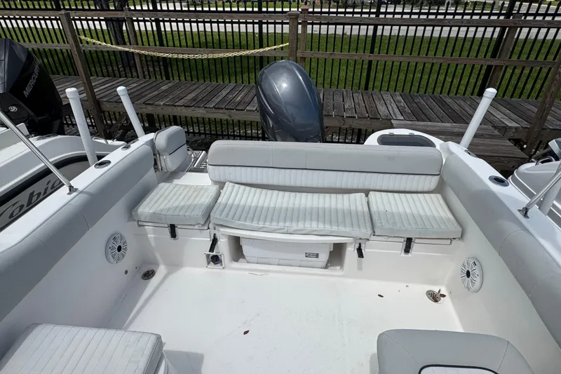 Slide: The Image of 2020 Sea Fox 226 Traveler boat interior with cushioned seating and storage. - 18