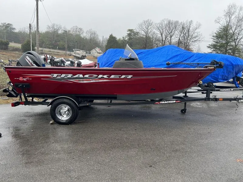 The Image of 2023 Tracker Pro Guide™ V-16 SC fishing boat on trailer. - 1