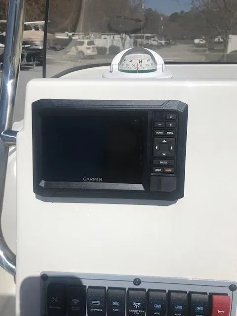 Slide: The Image of Garmin navigation system on 2024 Key West 189 FS boat dashboard. - 21