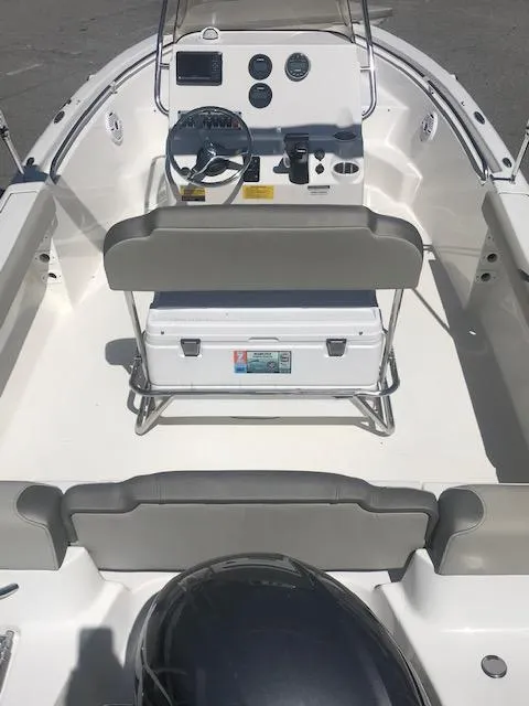 Slide: The Image of 2024 Key West 189 FS boat interior with steering console and seating. - 22