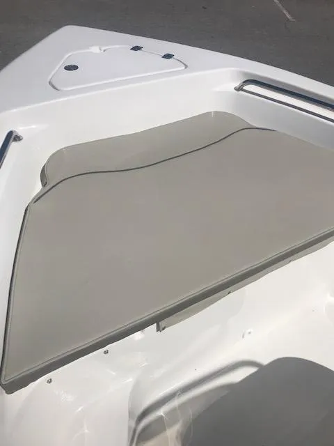 Slide: The Image of 2024 Key West 189 FS boat bow seating area with cushion. - 7