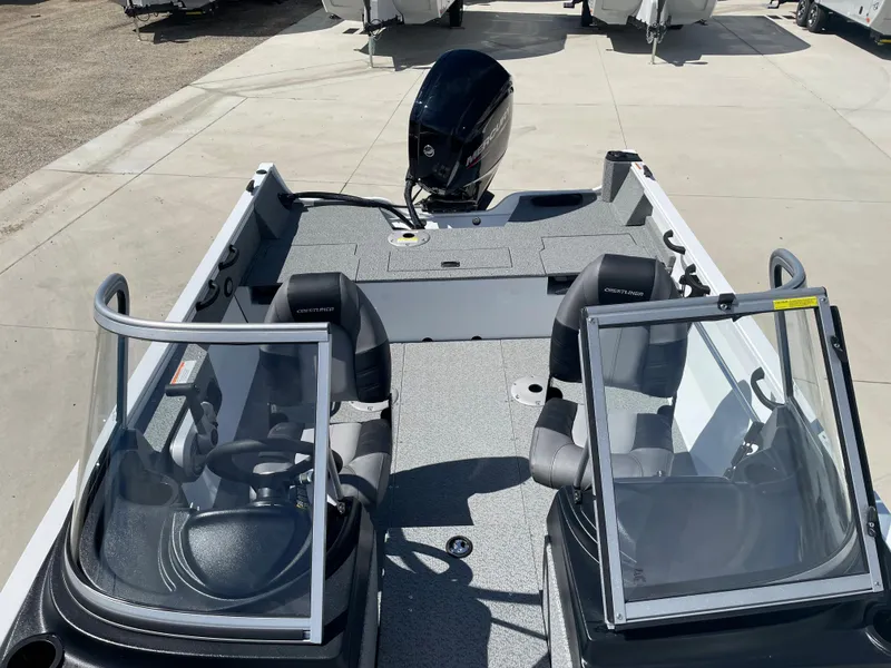 Slide: The Image of 2022 Crestliner 1700 Vision boat with dual consoles and outboard motor. - 12