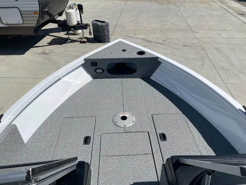 Slide: The Image of 2022 Crestliner 1700 Vision boat deck with storage compartments and fishing seat mount. - 15