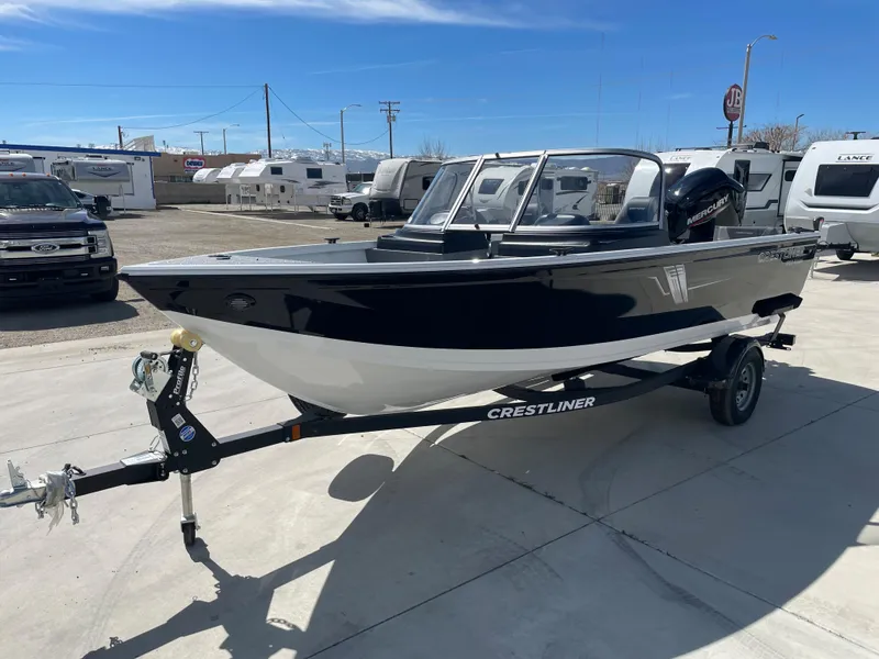 Slide: The Image of 2022 Crestliner 1700 Vision boat on trailer in outdoor lot. - 5