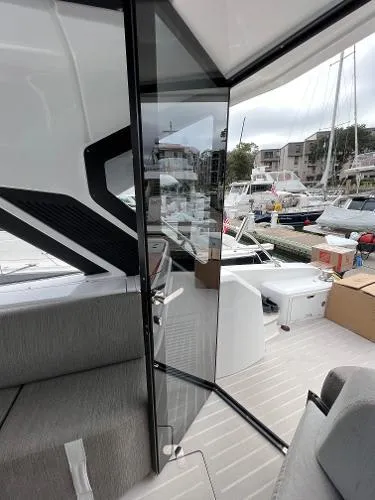 Slide: The Image of 2019 Azimut 51 ATLANTIS COUPE yacht interior with marina view. - 18