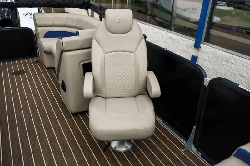 Slide: The Image of Luxurious seating on 2023 Premier 230 Solaris boat with elegant beige upholstery. - 25