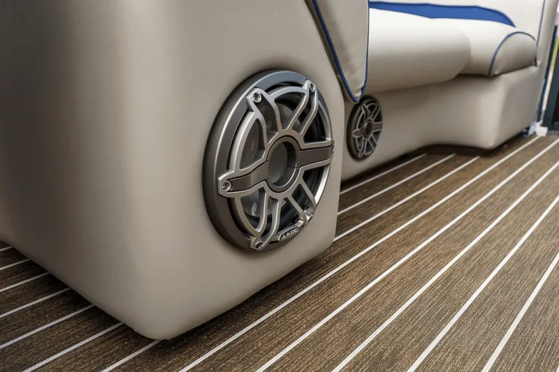 Slide: The Image of 2023 Premier 230 Solaris boat interior with sleek speaker and striped flooring. - 30