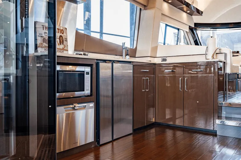 Slide: The Image of Luxurious kitchen interior of 2017 Carver 52 Command Bridge yacht with modern appliances. - 15