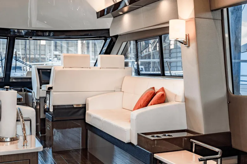 Slide: The Image of Luxurious interior of 2017 Carver 52 Command Bridge yacht with elegant seating and modern design. - 24