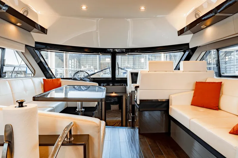 Slide: The Image of Luxurious interior of 2017 Carver 52 Command Bridge yacht with elegant seating and modern design. - 31