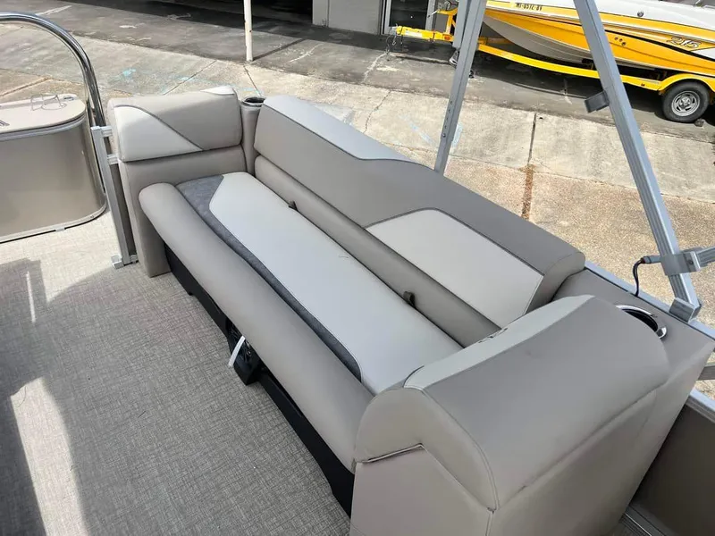 Slide: The Image of 2023 Avalon 2380 Venture Quad Lounger interior seating area with beige upholstery. - 5