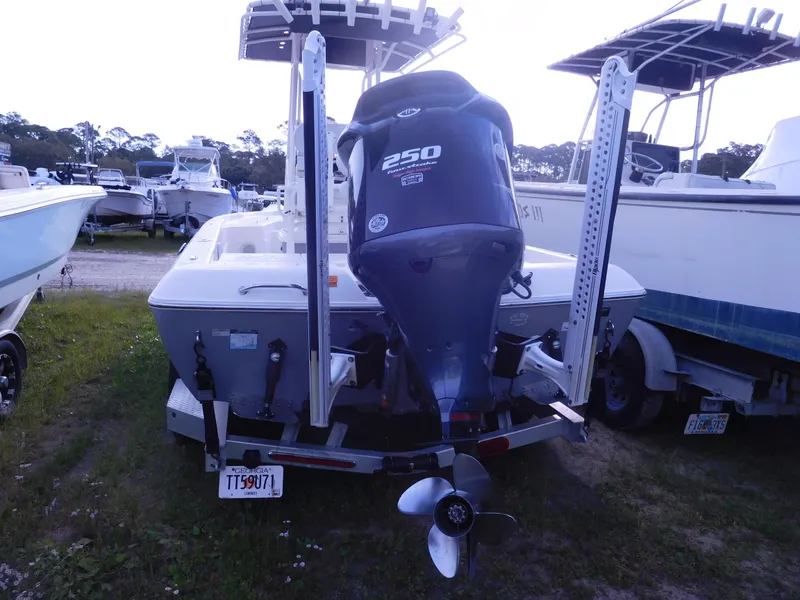 Slide: The Image of 2015 Skeeter SX 240 boat with 250 HP outboard motor, rear view. - 3