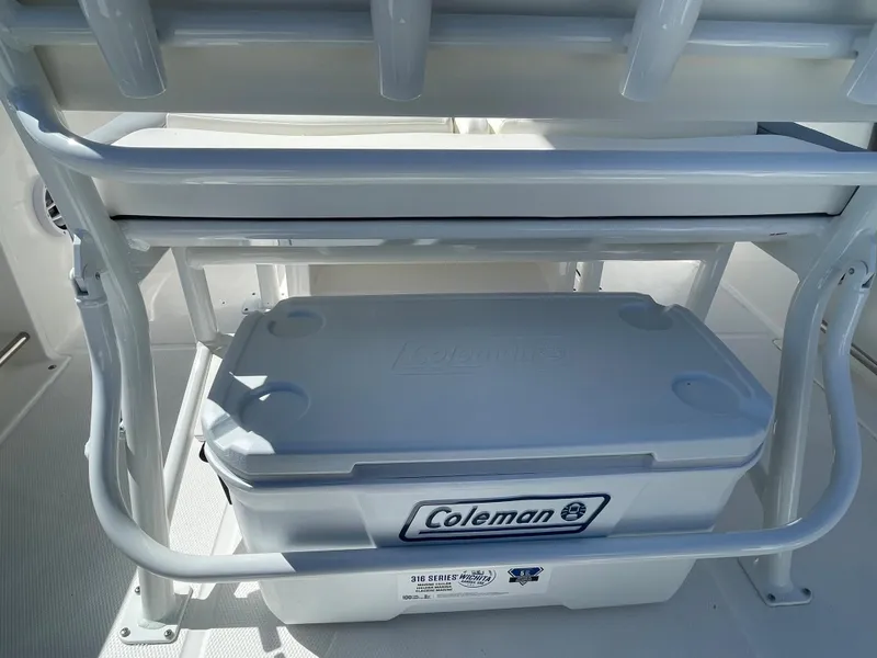 Slide: The Image of Coleman cooler on 2024 Robalo R222 Center Console boat. - 7