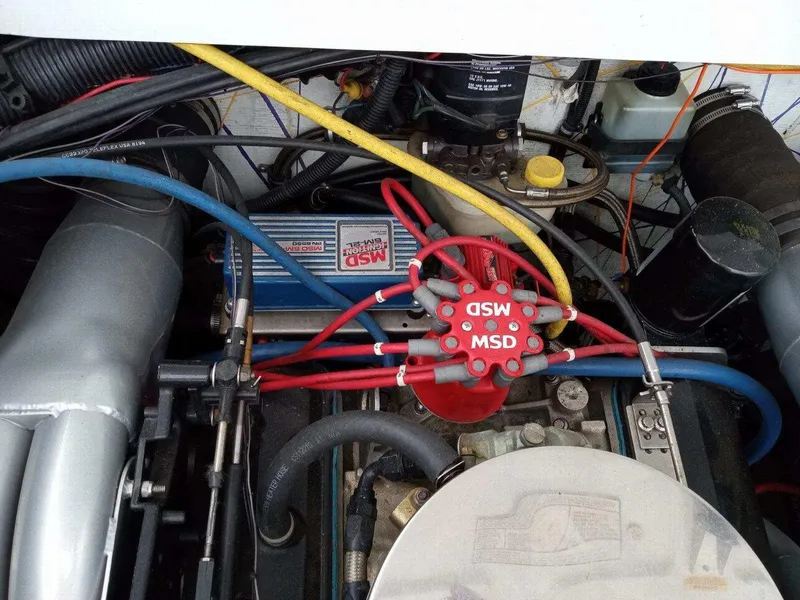 Slide: The Image of 1999 Baja 33 Outlaw engine with MSD ignition system and colorful wiring. - 16