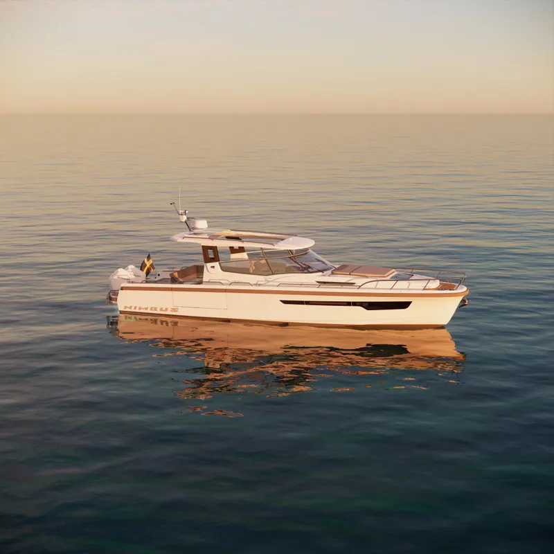 Slide: The Image of 2024 Nimbus W11 boat on calm water at sunset. - 1