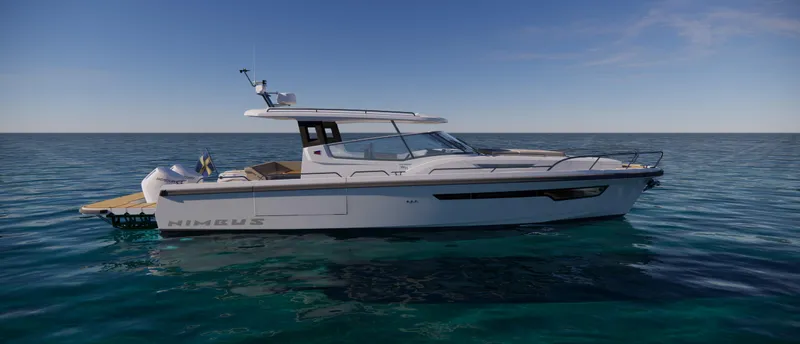 Slide: The Image of 2024 Nimbus W11 luxury motor yacht on calm ocean waters. - 12