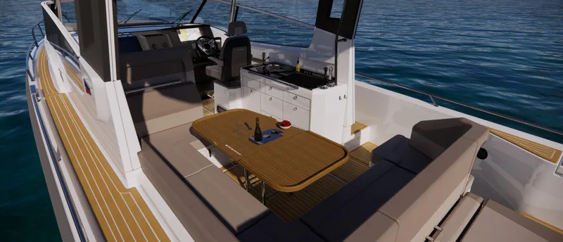 Slide: The Image of 2024 Nimbus W11 boat interior with seating, table, and kitchenette on the water. - 17