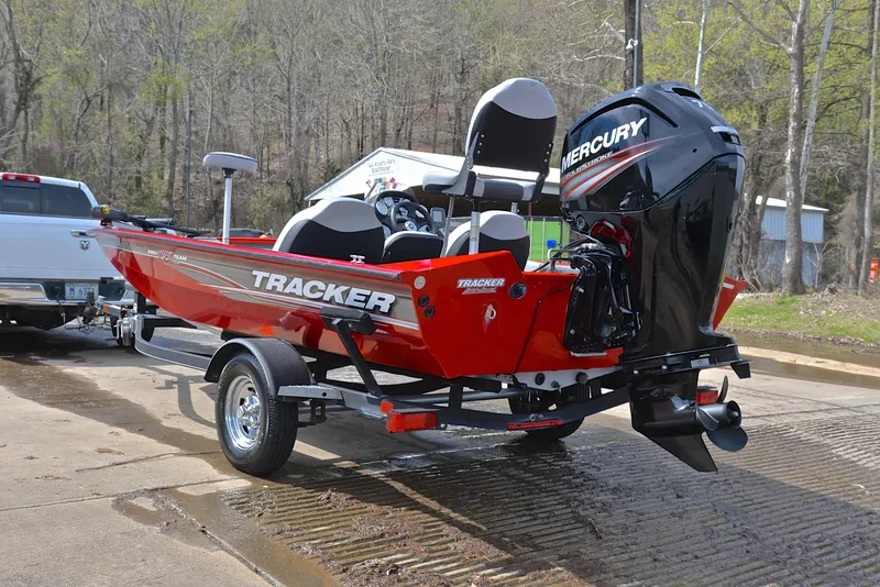 Slide: The Image of 2017 Tracker Pro Team 175 TXW boat with Mercury outboard motor on trailer. - 12