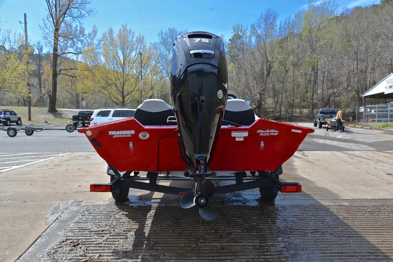 Slide: The Image of 2017 Tracker Pro Team 175 TXW boat on trailer, rear view at boat ramp. - 13