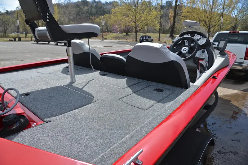 Slide: The Image of 2017 Tracker Pro Team 175 TXW fishing boat with gray carpet and seating. - 19