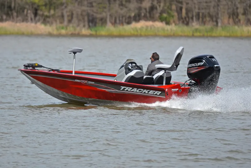 Slide: The Image of 2017 Tracker Pro Team 175 TXW boat on a lake. - 4