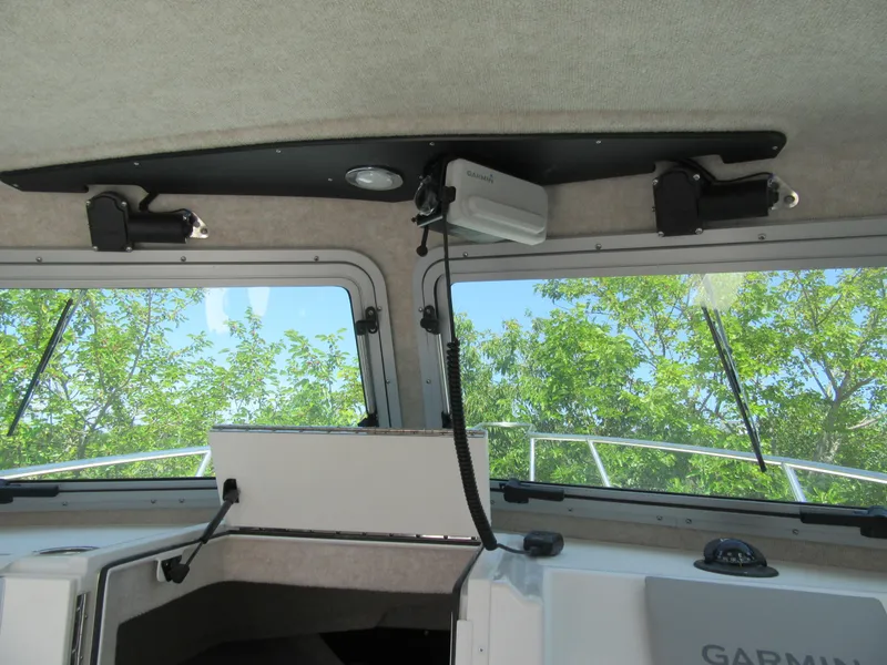 Slide: The Image of Interior view of 2023 Parker 2520 XLD Sport Cabin with Garmin electronics. - 11