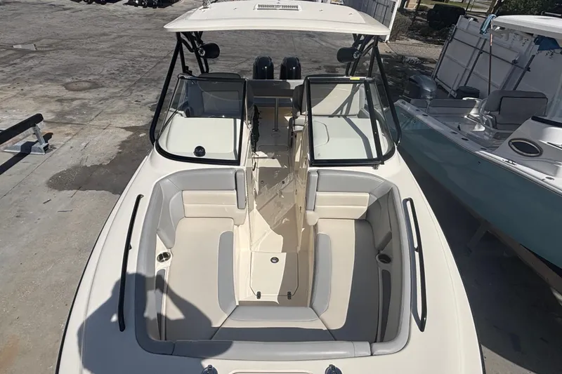 Slide: The Image of 2022 Scout 255 Dorado boat with spacious seating and sleek design. - 14