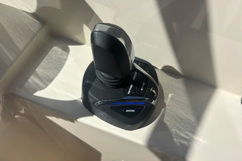 Slide: The Image of Joystick control on 2022 Scout 255 Dorado boat dashboard. - 19