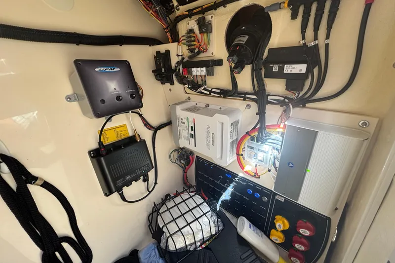 Slide: The Image of 2022 Scout 255 Dorado boat electrical system with various components and wiring. - 25