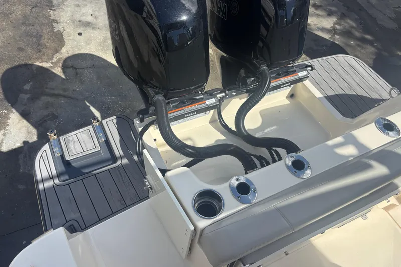 Slide: The Image of 2022 Scout 255 Dorado boat with dual Yamaha engines and sleek deck design. - 7