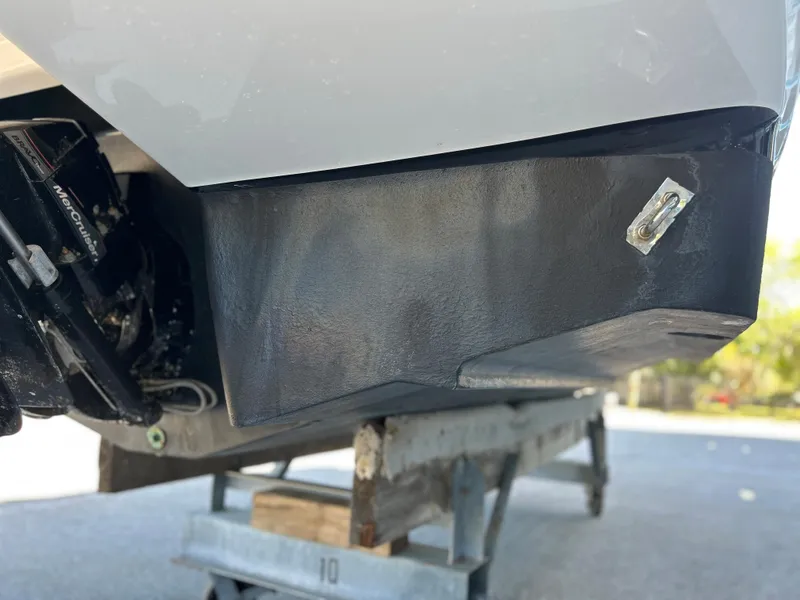 Slide: The Image of 2014 Chaparral Sunesta 244 boat hull on a trailer. - 17