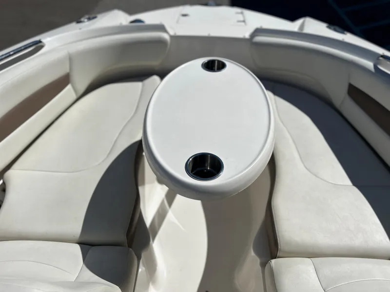 Slide: The Image of 2014 Chaparral Sunesta 244 boat interior with seating and table. - 25