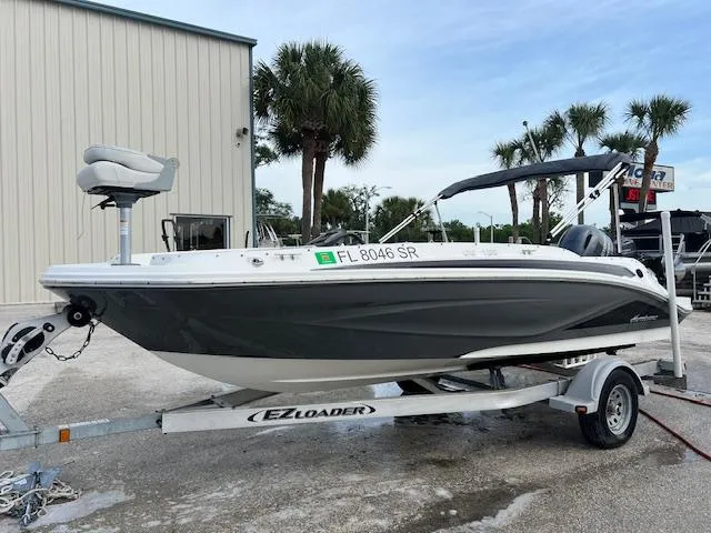Slide: The Image of 2020 Hurricane SunDeck Sport 185 OB boat on EZ Loader trailer. - 0