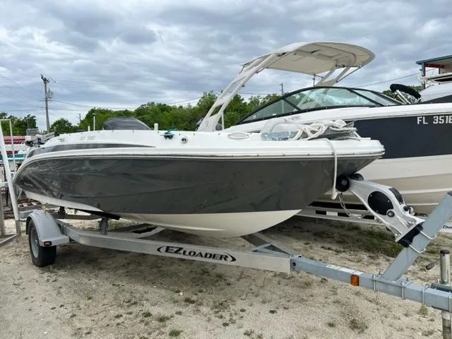 Slide: The Image of 2020 Hurricane SunDeck Sport 185 OB boat on EZ Loader trailer. - 1