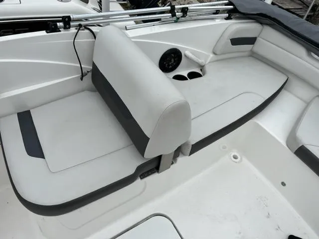 Slide: The Image of 2020 Hurricane SunDeck Sport 185 OB boat interior with white and gray seating. - 8