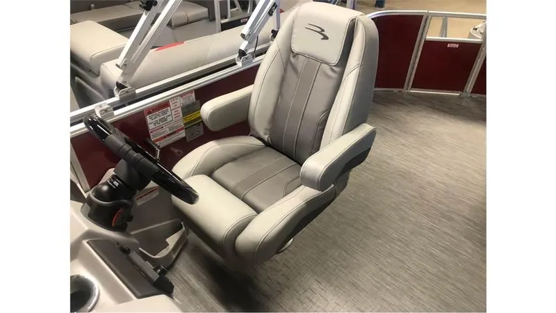 Slide: The Image of 2023 Bennington 24SXL boat captain's chair and steering console. - 10