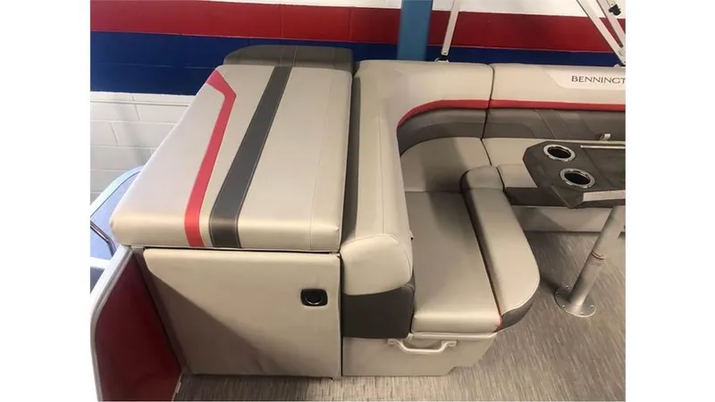 Slide: The Image of 2023 Bennington 24SXL boat interior with gray and red seating. - 5
