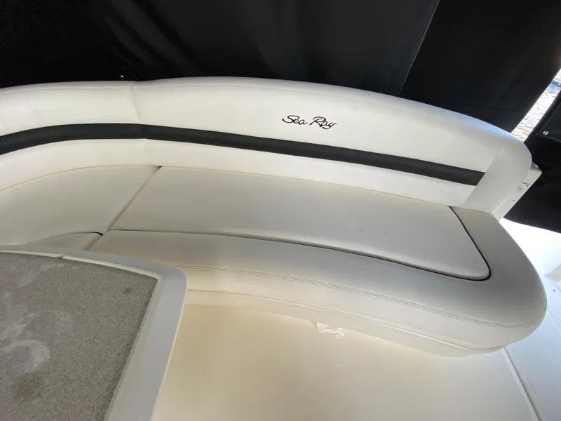 Slide: The Image of 2006 Sea Ray Sundancer 44 white leather seating with black accents. - 12